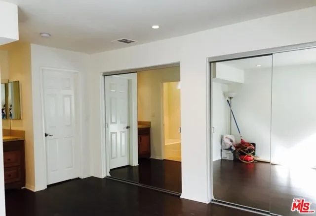 a view of a hallway with entryway