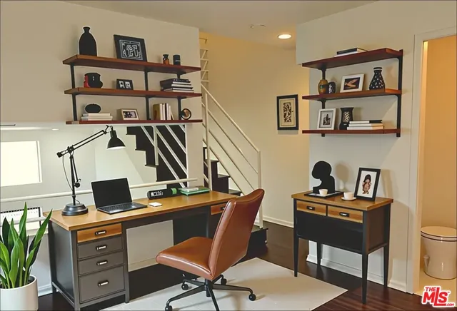a view of a workspace with furniture