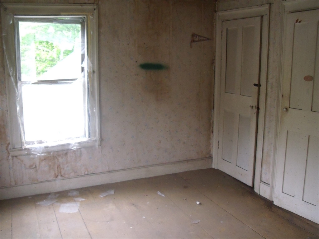 35 Goshen Road Williamsburg, MA 01096 - Photo 9 of 21 a view of an empty room with a window