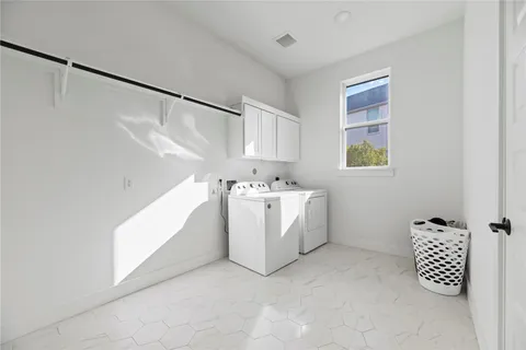a view of utility room with washer and dryer