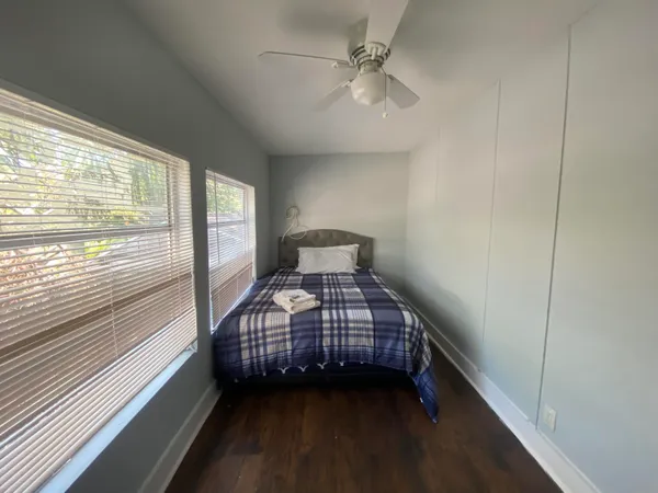 a view of a bedroom with window