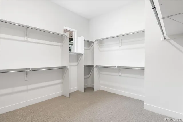 a view of an empty walk in closet