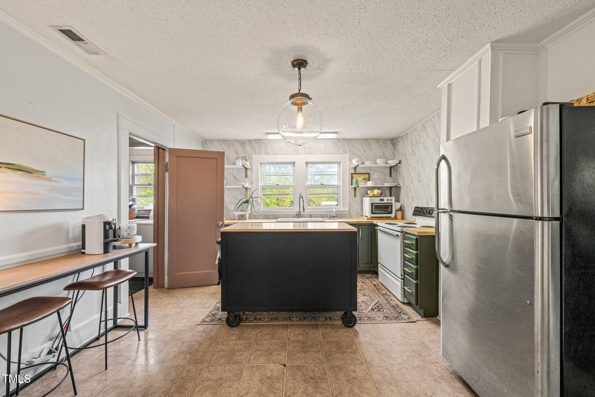 12601 Boyce Mill Road Raleigh, NC 27613 - Photo 11 of 35 a kitchen with stainless steel appliances granite countertop a refrigerator and a stove top oven
