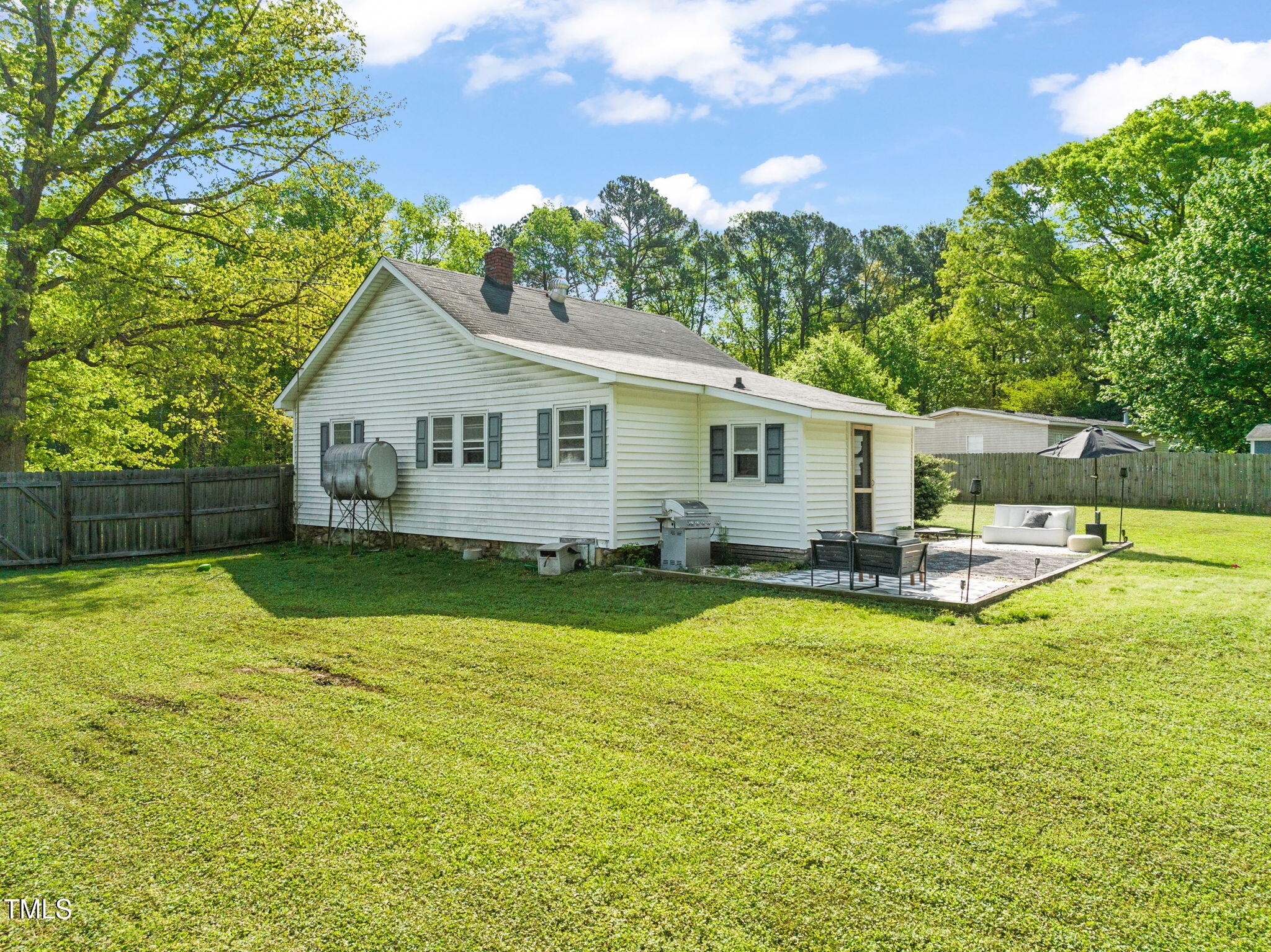 12601 Boyce Mill Road Raleigh, NC 27613 - Photo 23 of 35 a view of a house with swimming pool and a yard