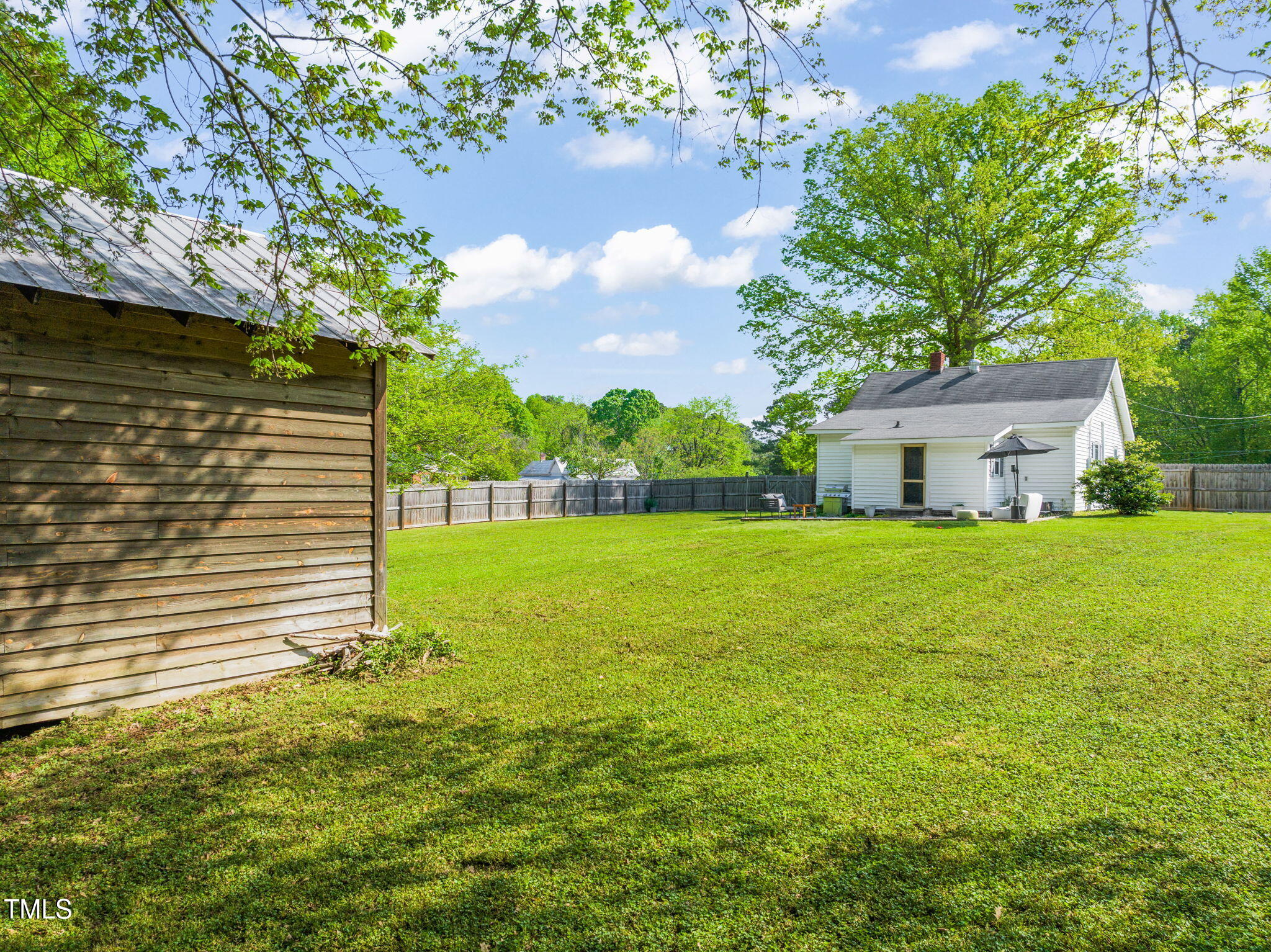 12601 Boyce Mill Road Raleigh, NC 27613 - Photo 25 of 35 a front view of house with yard and green space
