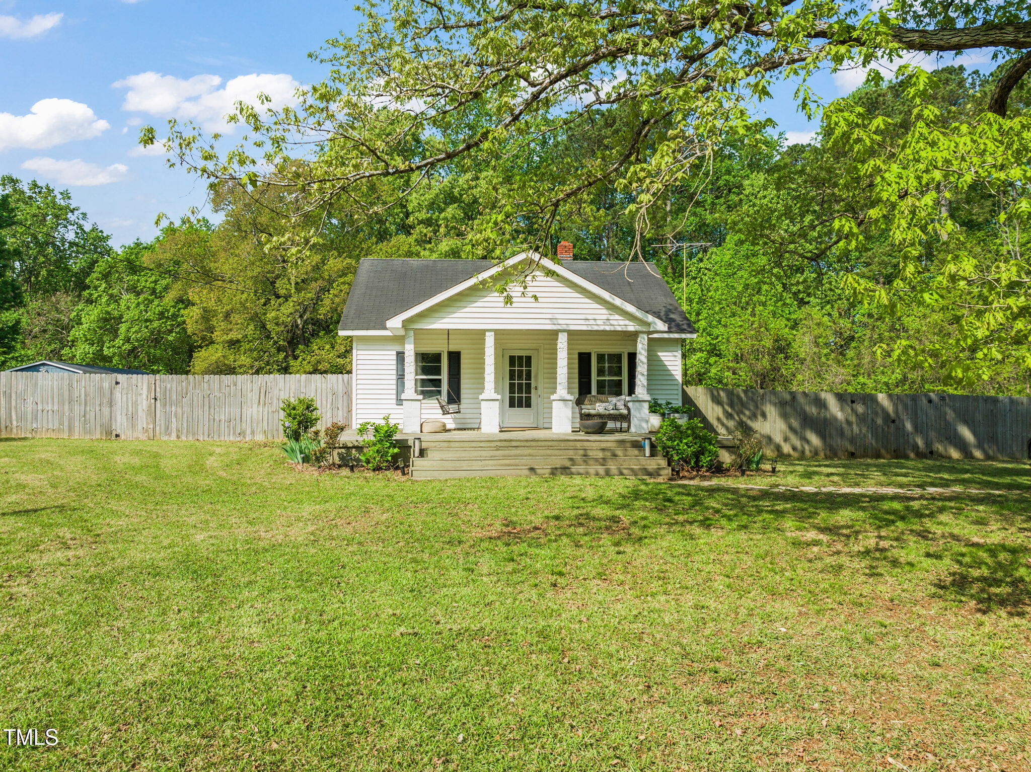12601 Boyce Mill Road Raleigh, NC 27613 - Photo 27 of 35 a front view of a house with a yard