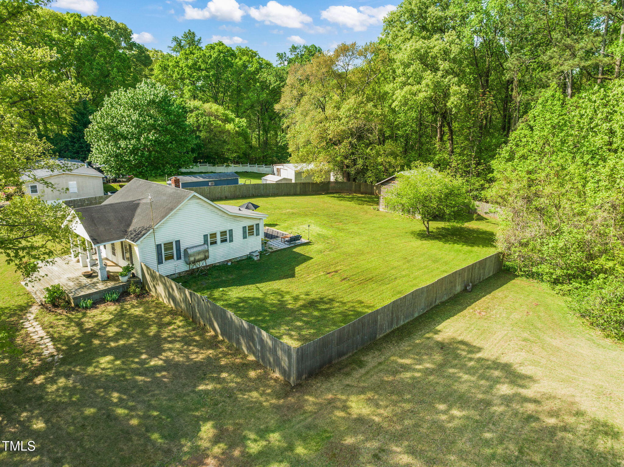 12601 Boyce Mill Road Raleigh, NC 27613 - Photo 30 of 35 a view of a house with pool and a yard