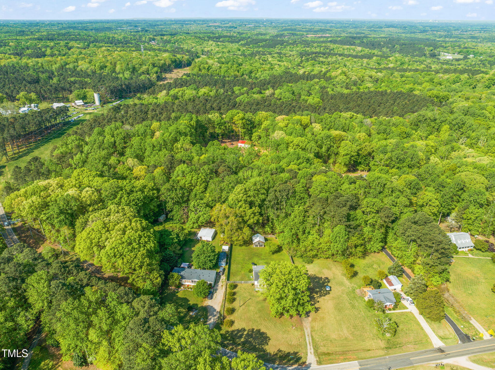 12601 Boyce Mill Road Raleigh, NC 27613 - Photo 33 of 35 a view of a yard with an outdoor space