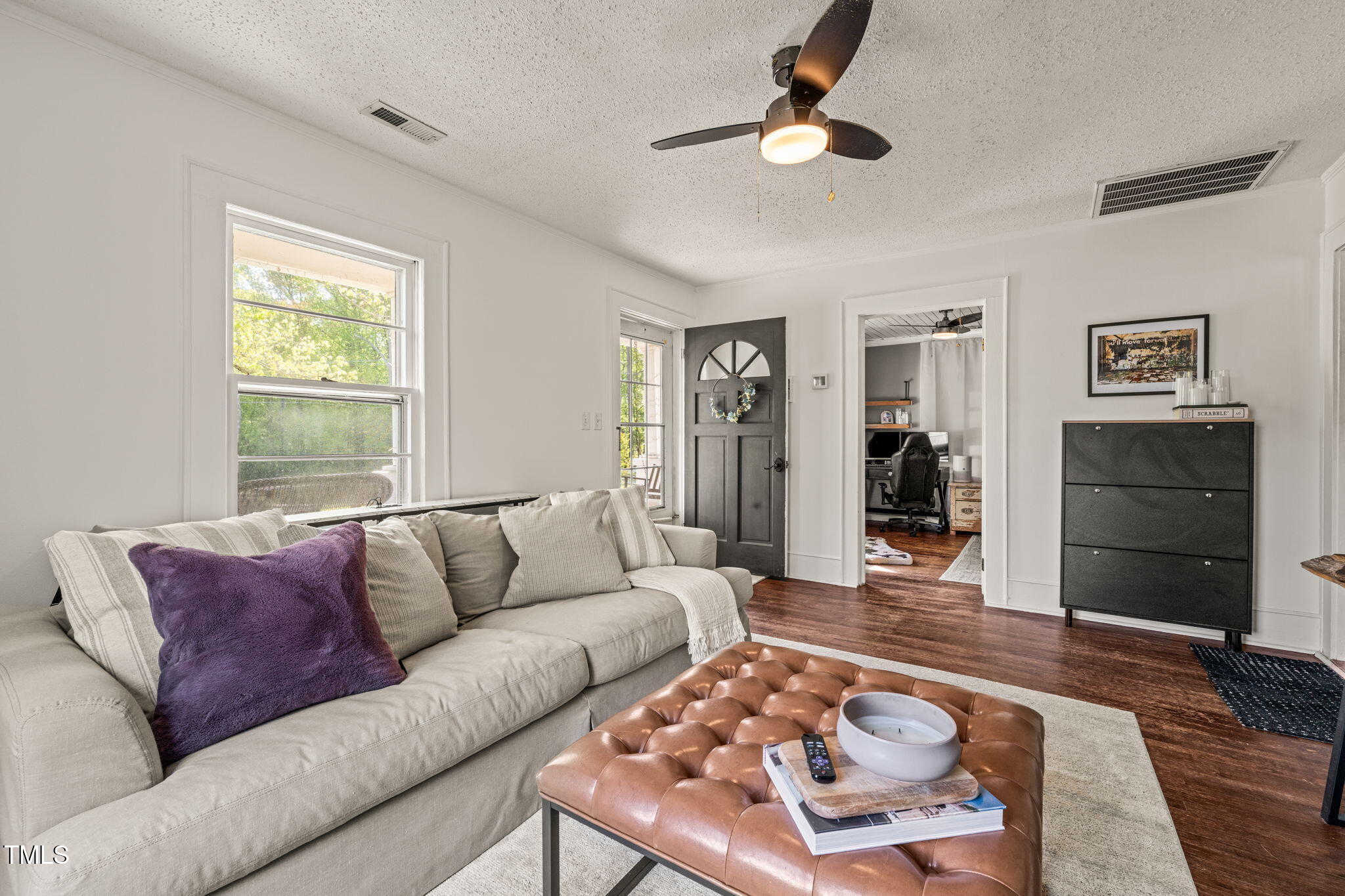12601 Boyce Mill Road Raleigh, NC 27613 - Photo 6 of 35 a living room with furniture and a wooden floor