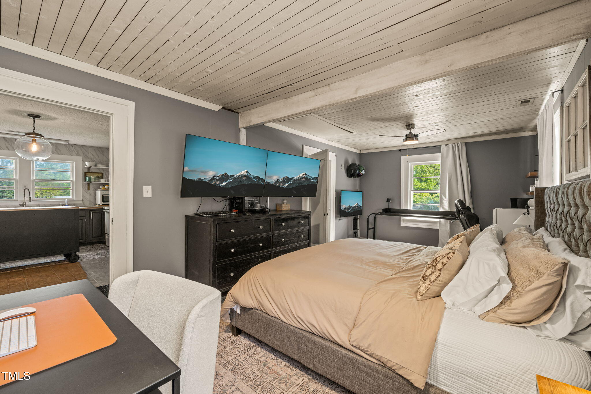 12601 Boyce Mill Road Raleigh, NC 27613 - Photo 9 of 35 a bedroom with a bed and wooden floor