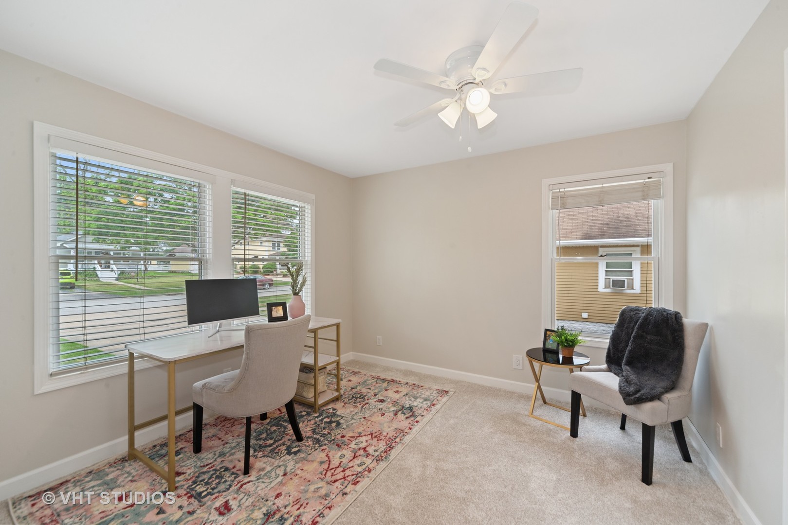 230 West Harrison Road Lombard, IL 60148 - Photo 20 of 31 a workspace with furniture a rug and a window