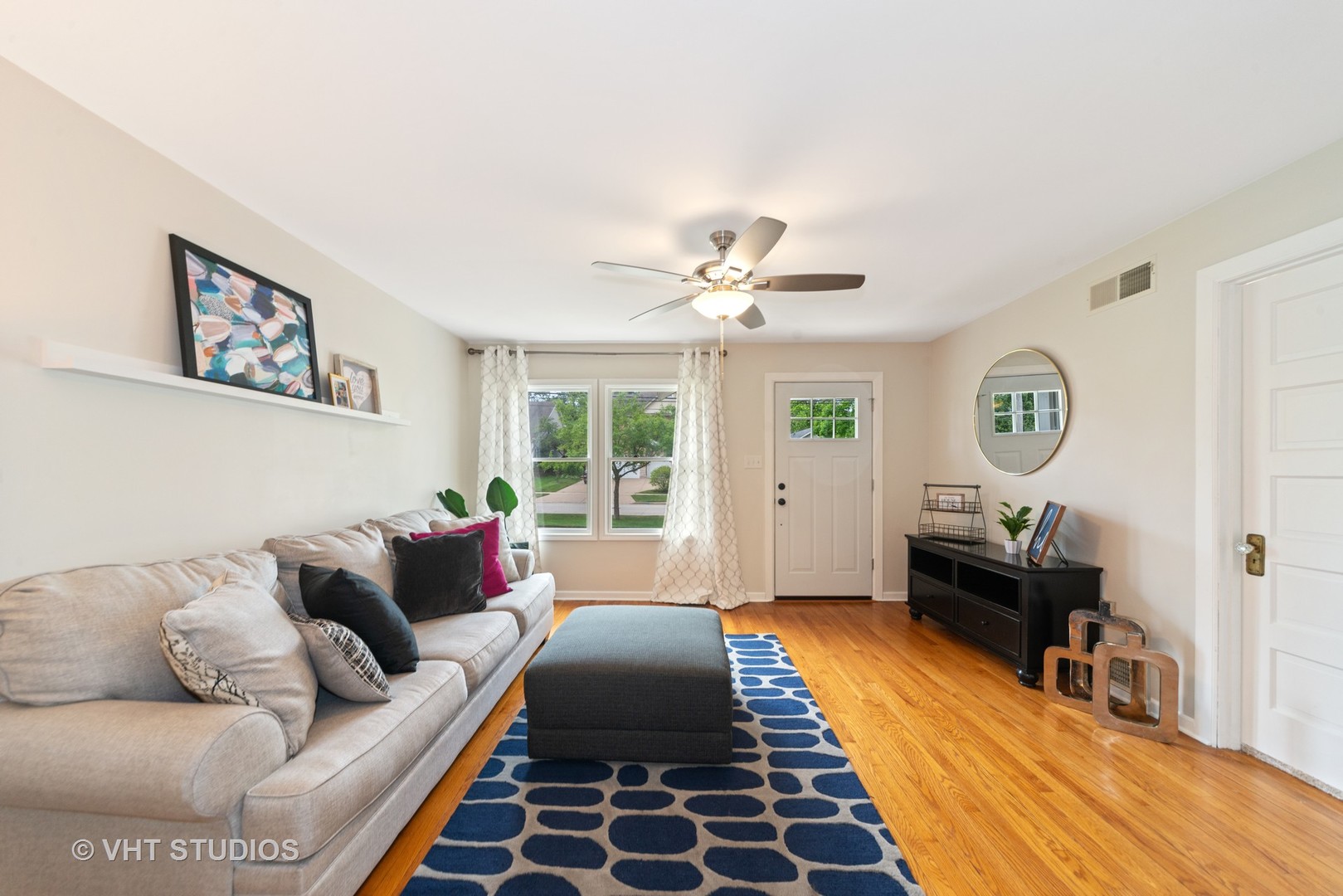 230 West Harrison Road Lombard, IL 60148 - Photo 3 of 31 a living room with furniture and a rug