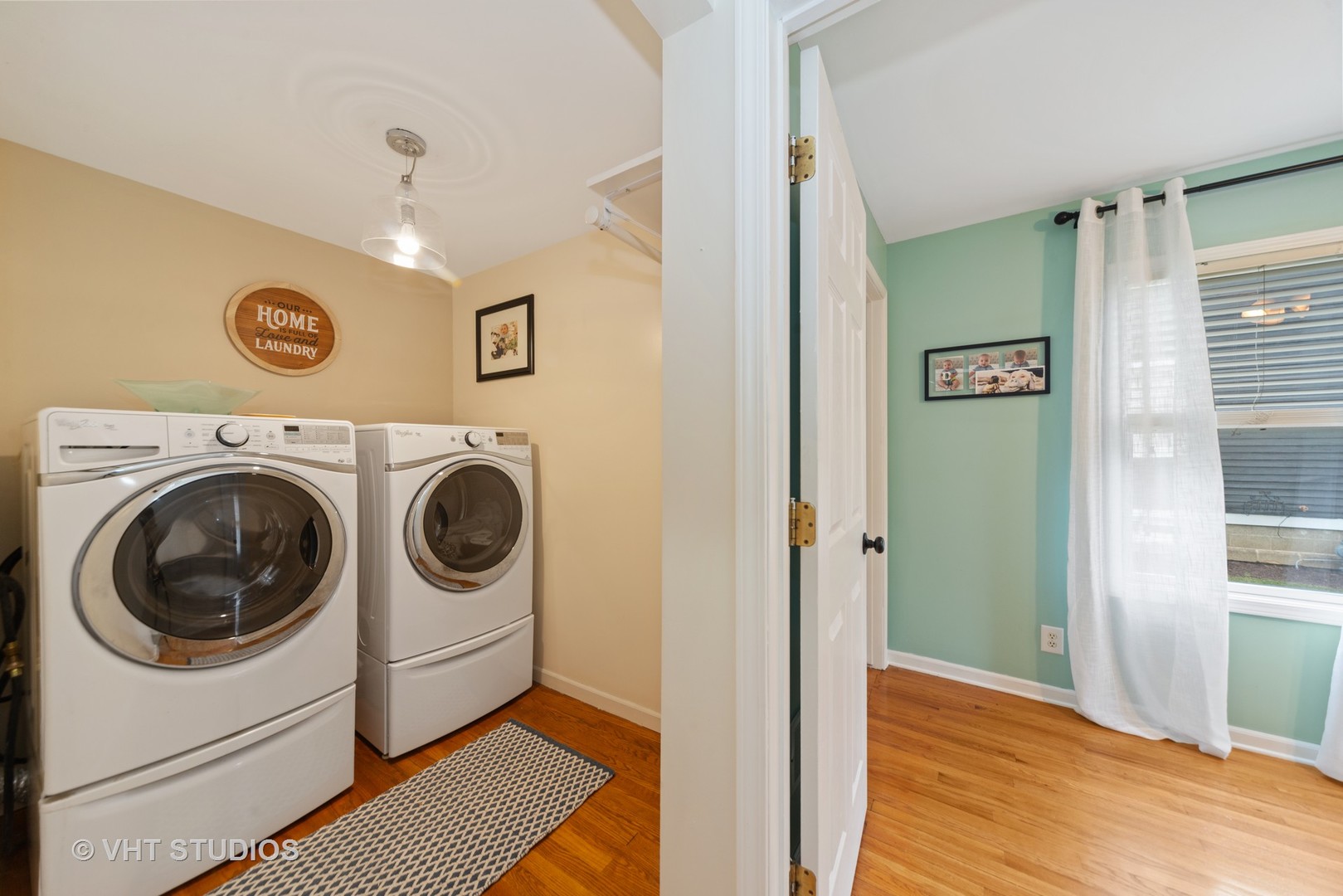 230 West Harrison Road Lombard, IL 60148 - Photo 23 of 31 a view of a hallway with washer and dryer