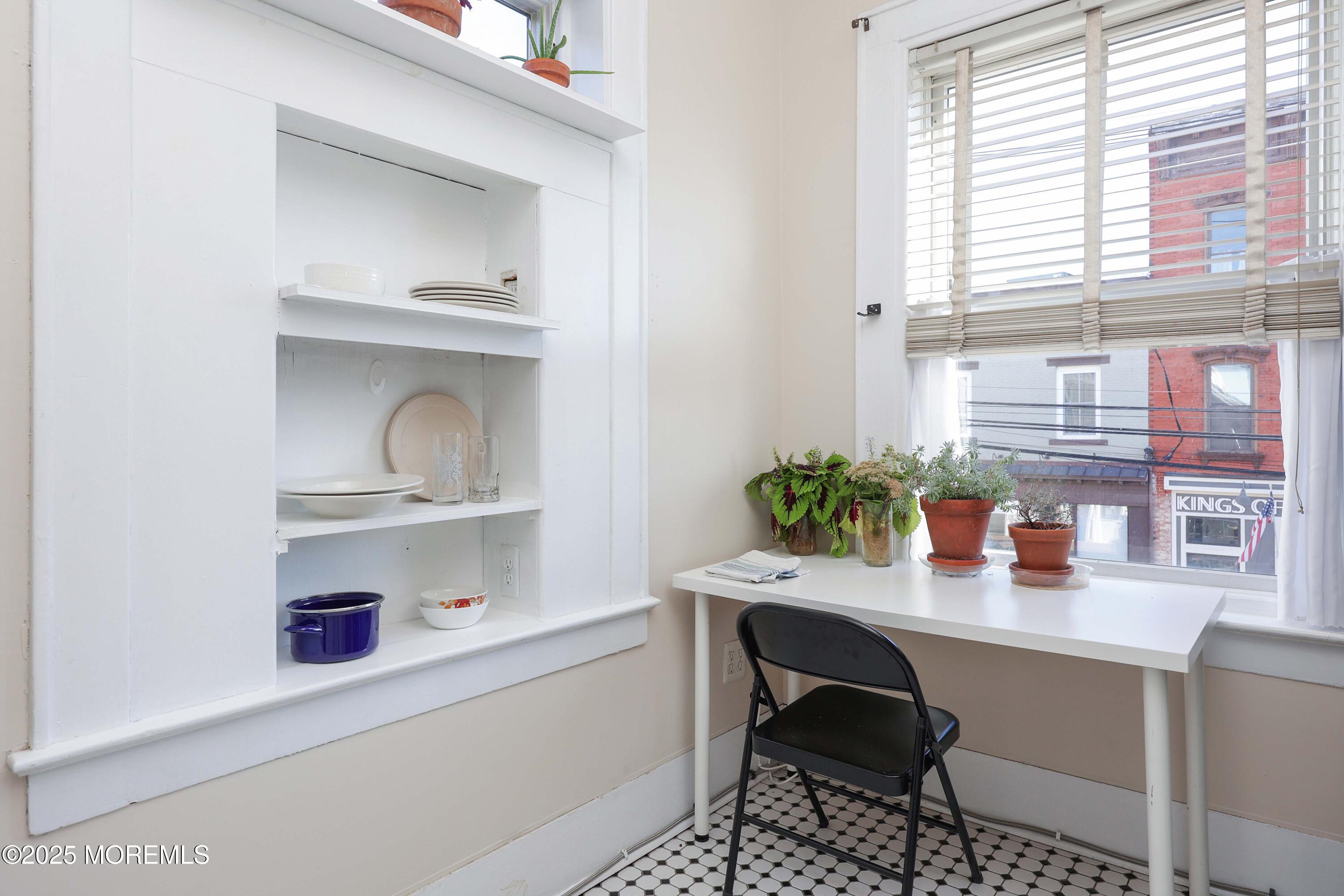 30 West Front Street, Unit E Red Bank, NJ 07701 - Photo 5 of 17 a room with a table and chair