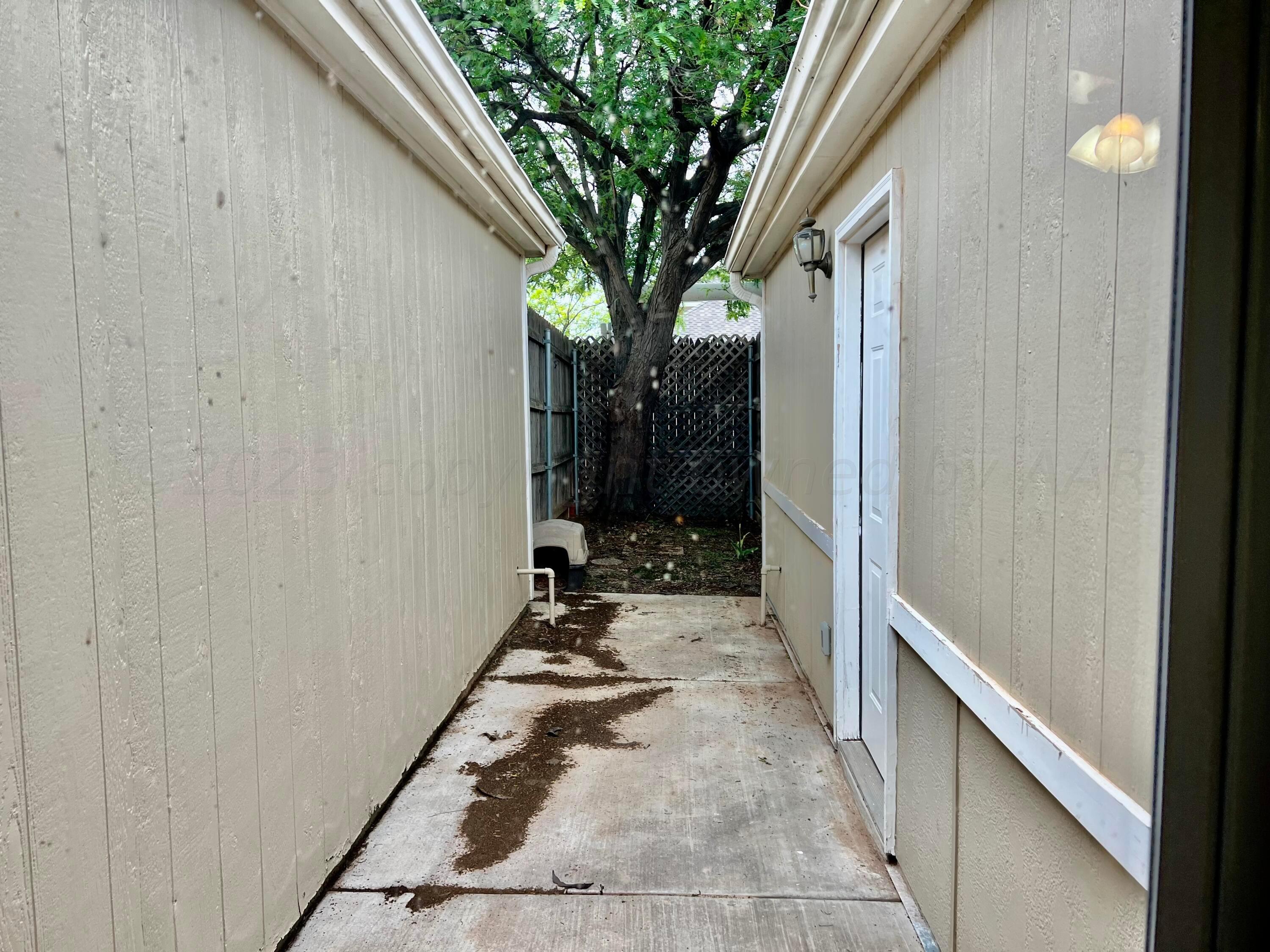 3416 B Gladstone Lane Amarillo, TX 79121 - Photo 16 of 17 a house view with a outdoor space