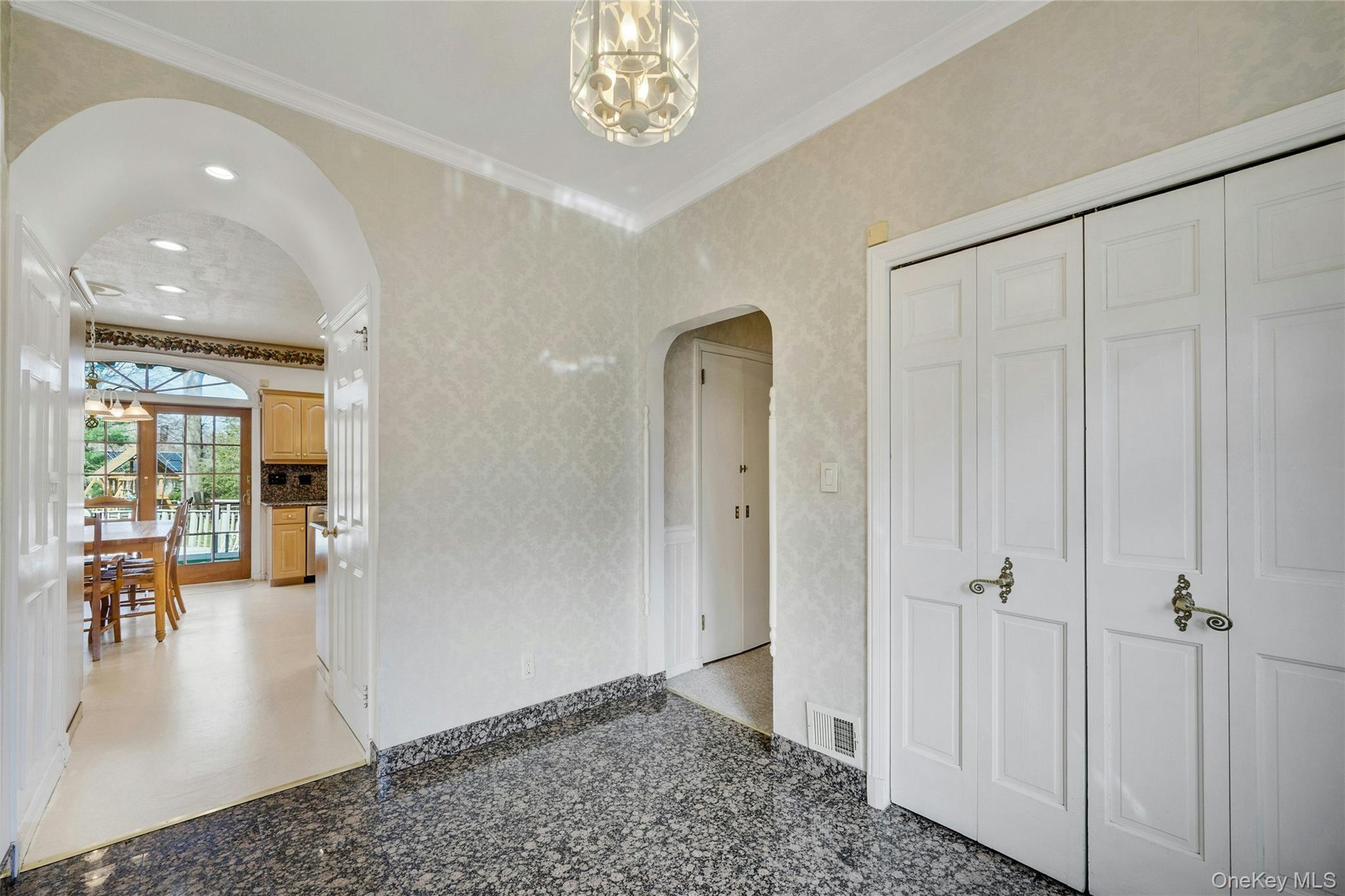 115 Elizabeth Road New Rochelle, NY 10804 - Photo 14 of 47 a view of a hallway with wooden floor and a living room