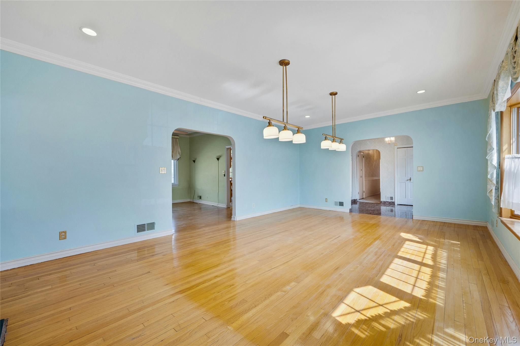 115 Elizabeth Road New Rochelle, NY 10804 - Photo 16 of 47 a view of a room with a chandelier