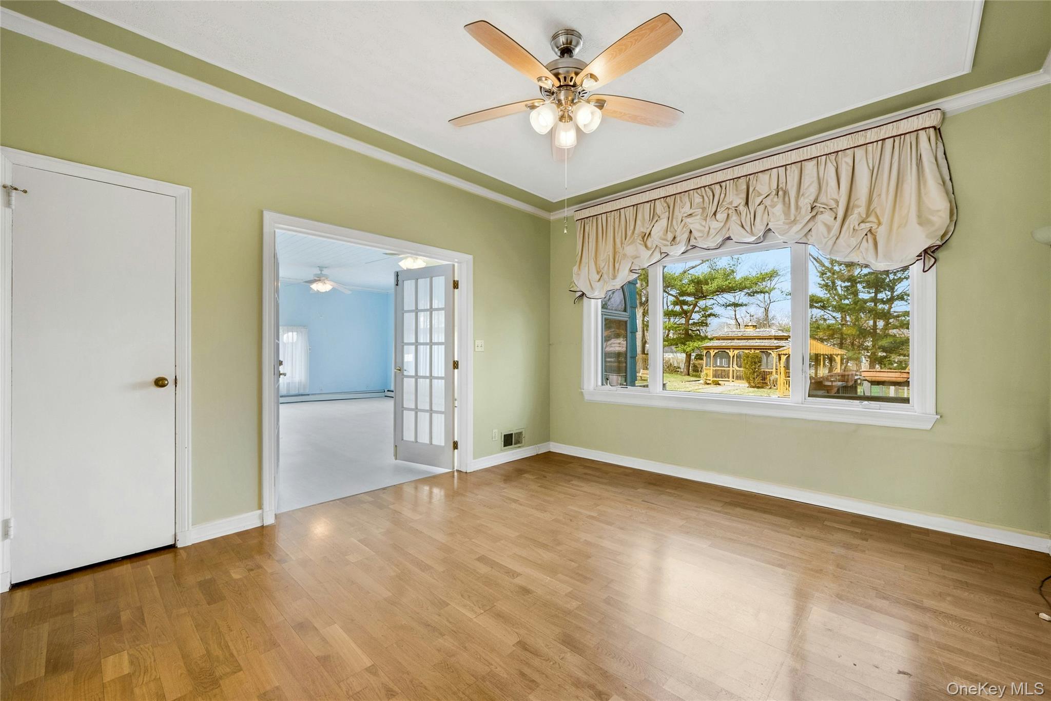 115 Elizabeth Road New Rochelle, NY 10804 - Photo 17 of 47 a view of an empty room with a window