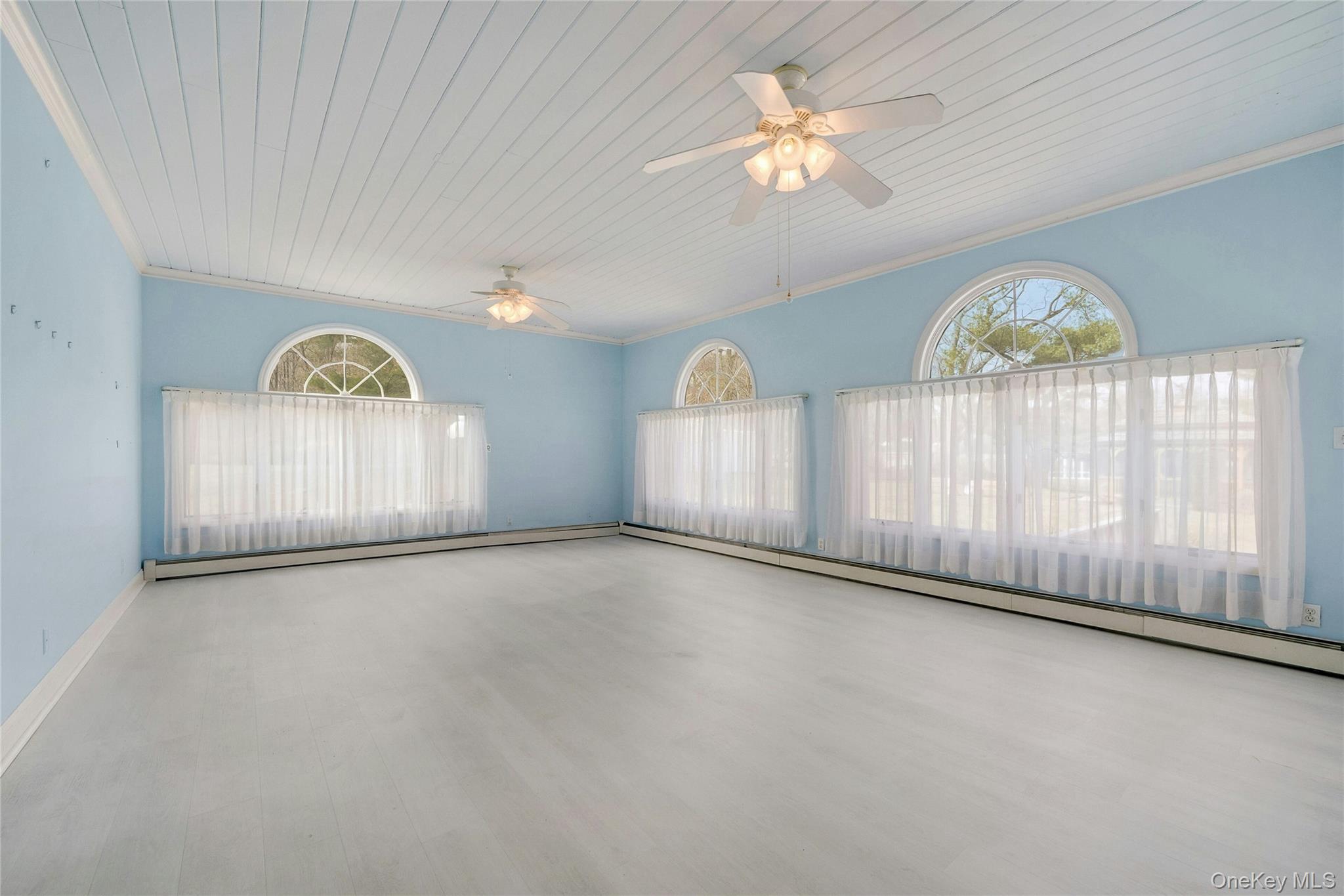 115 Elizabeth Road New Rochelle, NY 10804 - Photo 19 of 47 an empty room with a empty space and a window