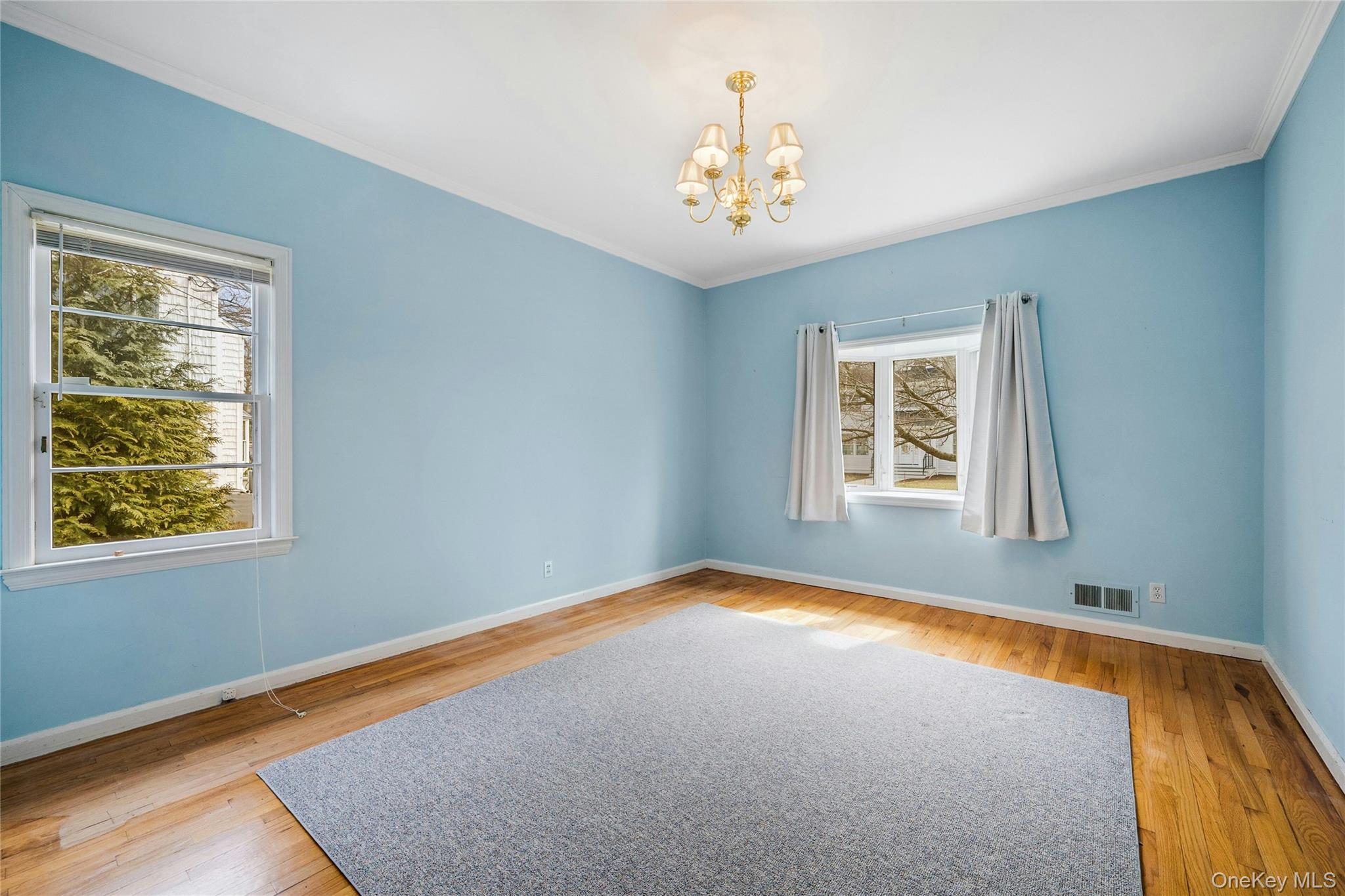 115 Elizabeth Road New Rochelle, NY 10804 - Photo 27 of 47 a view of an empty room with a window