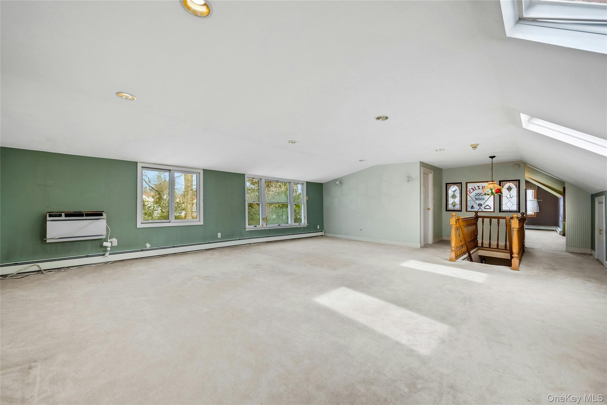115 Elizabeth Road New Rochelle, NY 10804 - Photo 33 of 47 a view of an empty room with a window and stairs