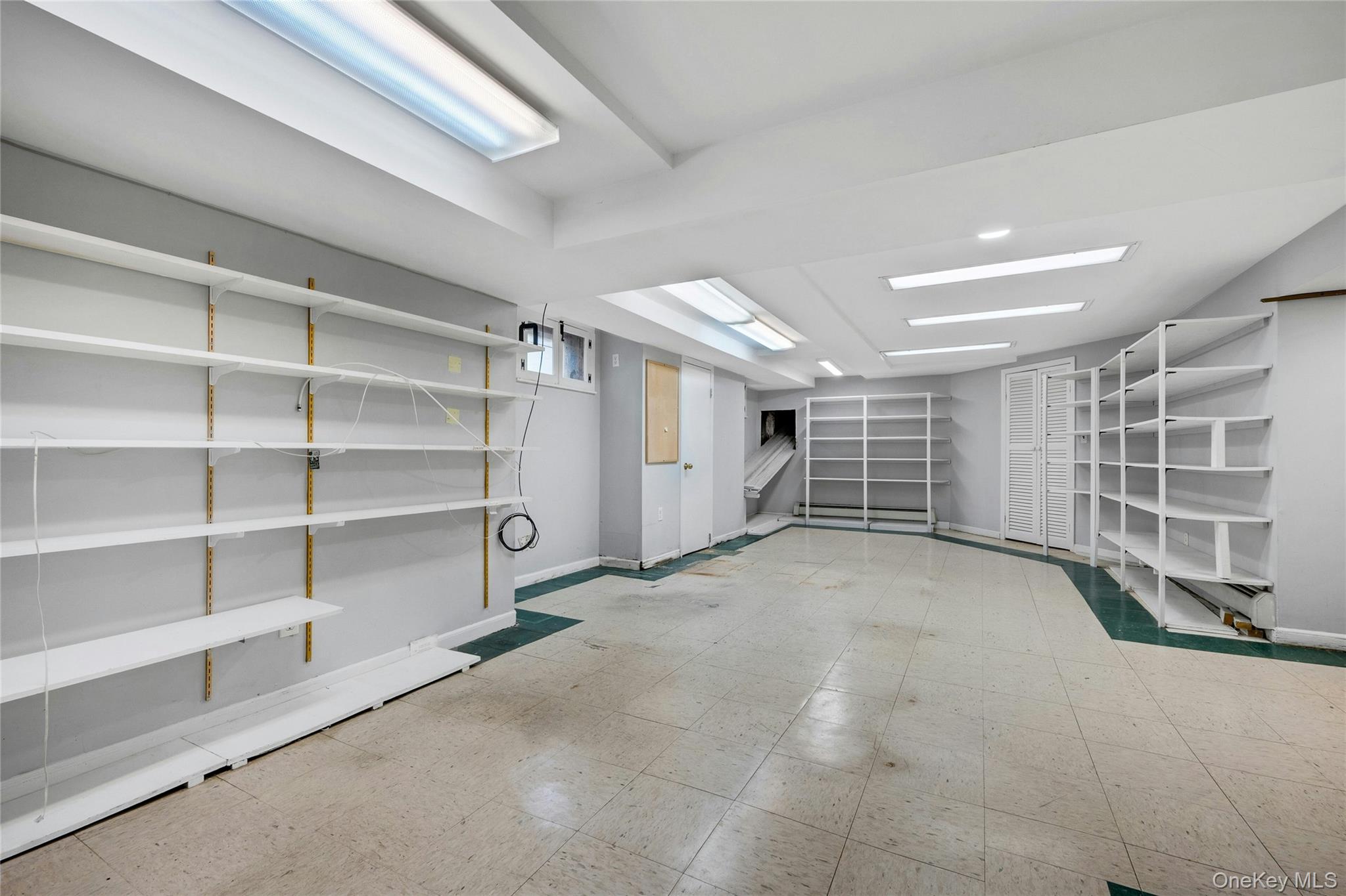 115 Elizabeth Road New Rochelle, NY 10804 - Photo 44 of 47 a view of an empty room with a window