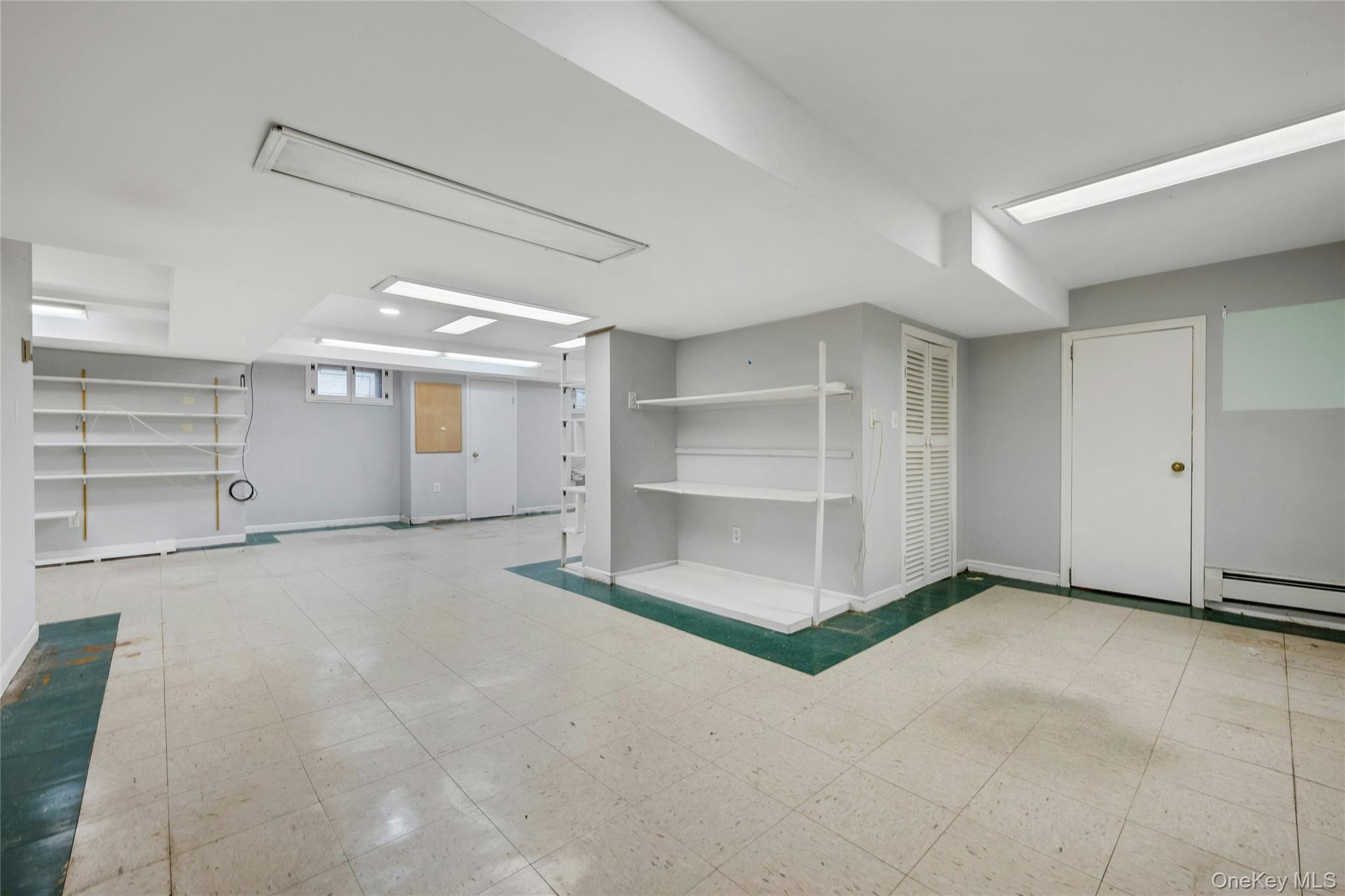 115 Elizabeth Road New Rochelle, NY 10804 - Photo 46 of 47 a view of an empty room with a fireplace