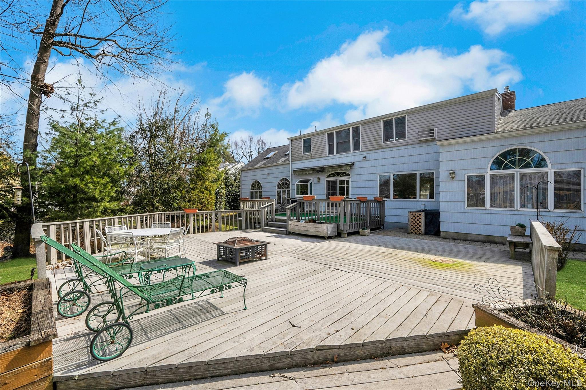 115 Elizabeth Road New Rochelle, NY 10804 - Photo 7 of 47 a view of a house with backyard and sitting area