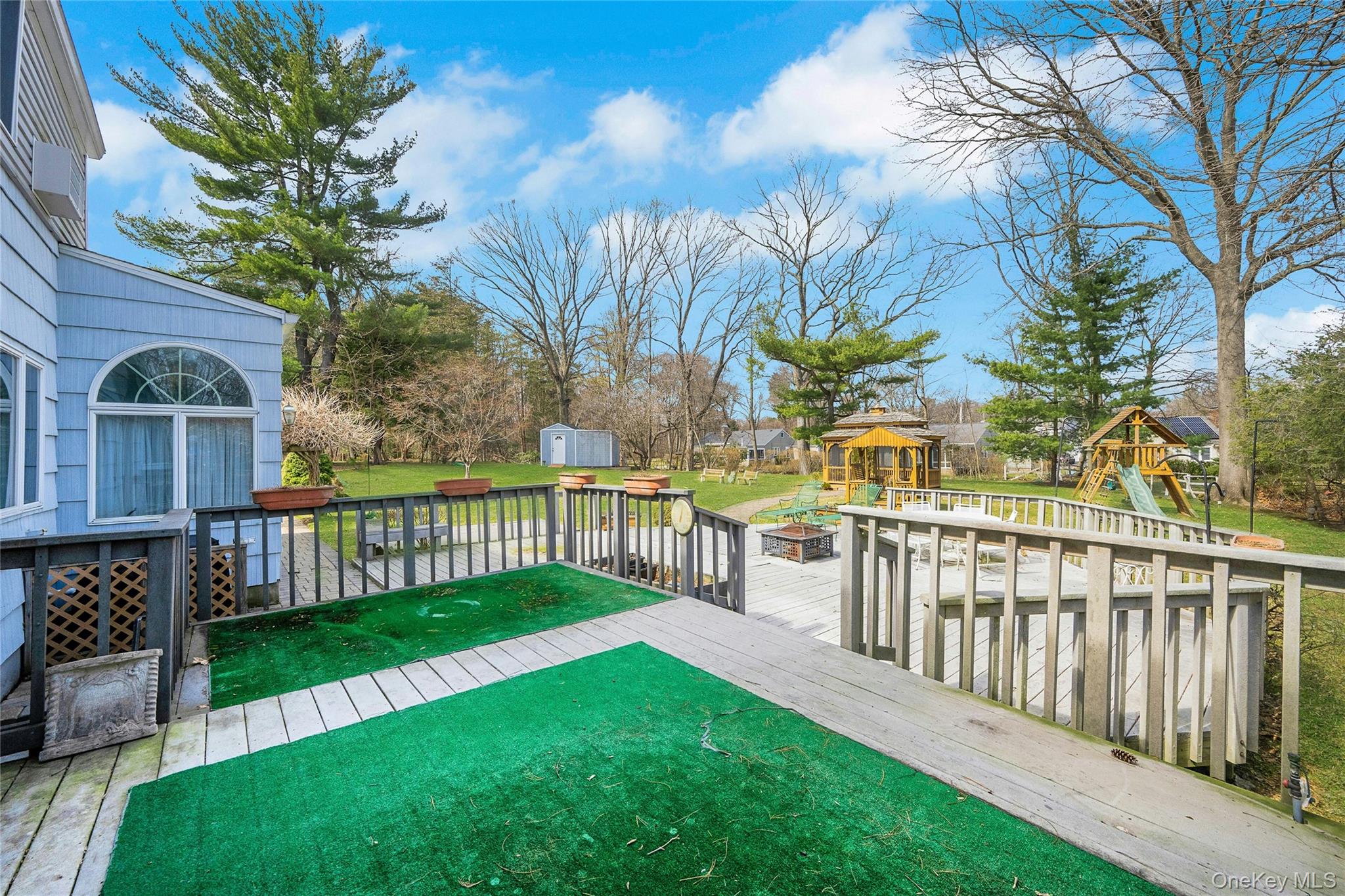 115 Elizabeth Road New Rochelle, NY 10804 - Photo 10 of 47 a view of a house with backyard and porch