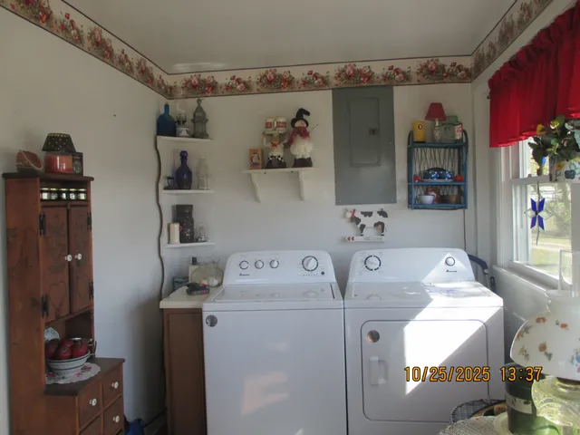 a utility room with dryer and washer