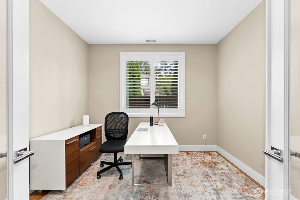 6578 Serenity Loop Gig Harbor, WA 98335 - Photo 13 of 38 a view of a workspace with furniture and a window
