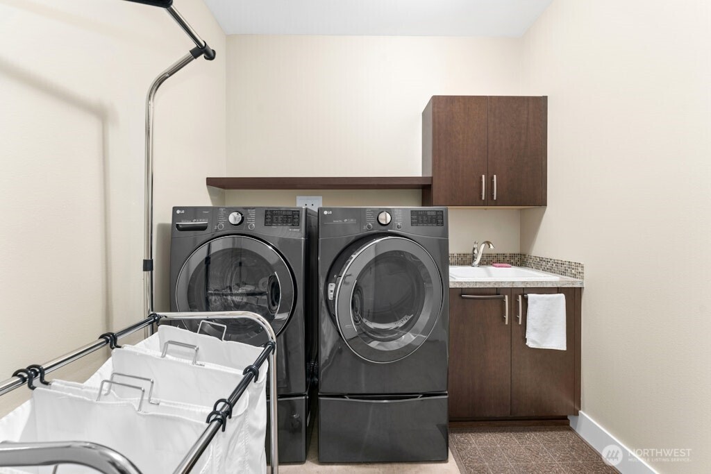 6578 Serenity Loop Gig Harbor, WA 98335 - Photo 20 of 38 a utility room with dryer and washer