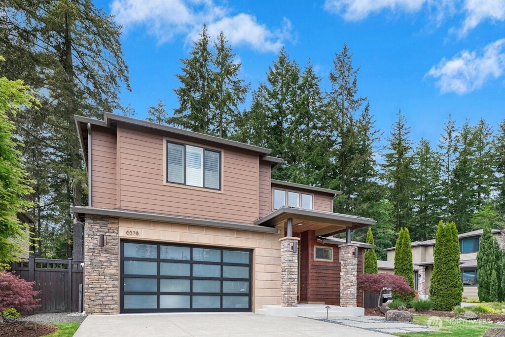 6578 Serenity Loop Gig Harbor, WA 98335 - Photo 2 of 38 a front view of a house with a yard