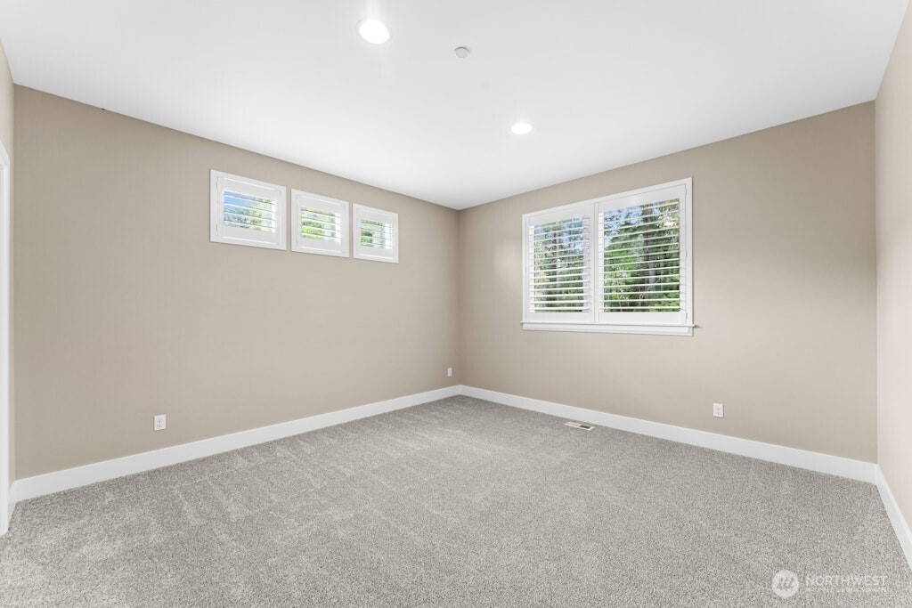 6578 Serenity Loop Gig Harbor, WA 98335 - Photo 25 of 38 an empty room with a window