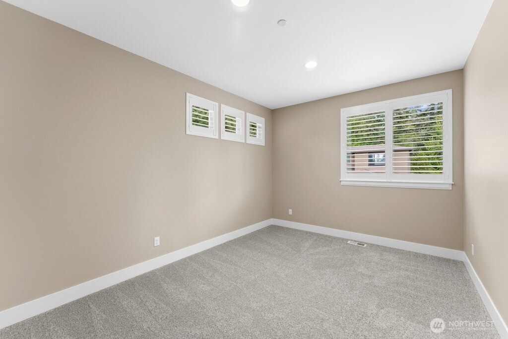 6578 Serenity Loop Gig Harbor, WA 98335 - Photo 30 of 38 a view of an empty room with a window