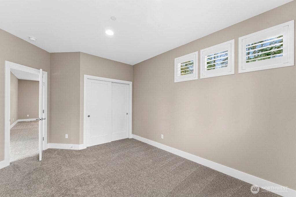 6578 Serenity Loop Gig Harbor, WA 98335 - Photo 31 of 38 a view of a hallway with closet