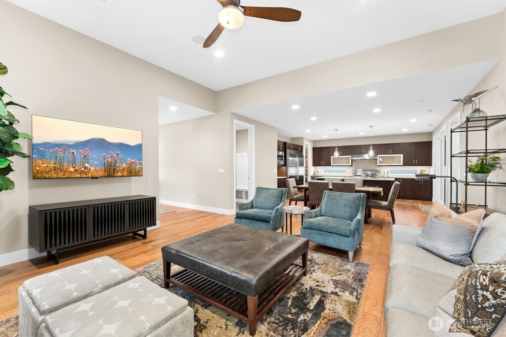6578 Serenity Loop Gig Harbor, WA 98335 - Photo 7 of 38 a living room with furniture and a fireplace