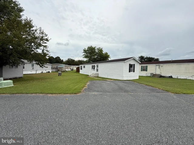 a view of a house with a big yard