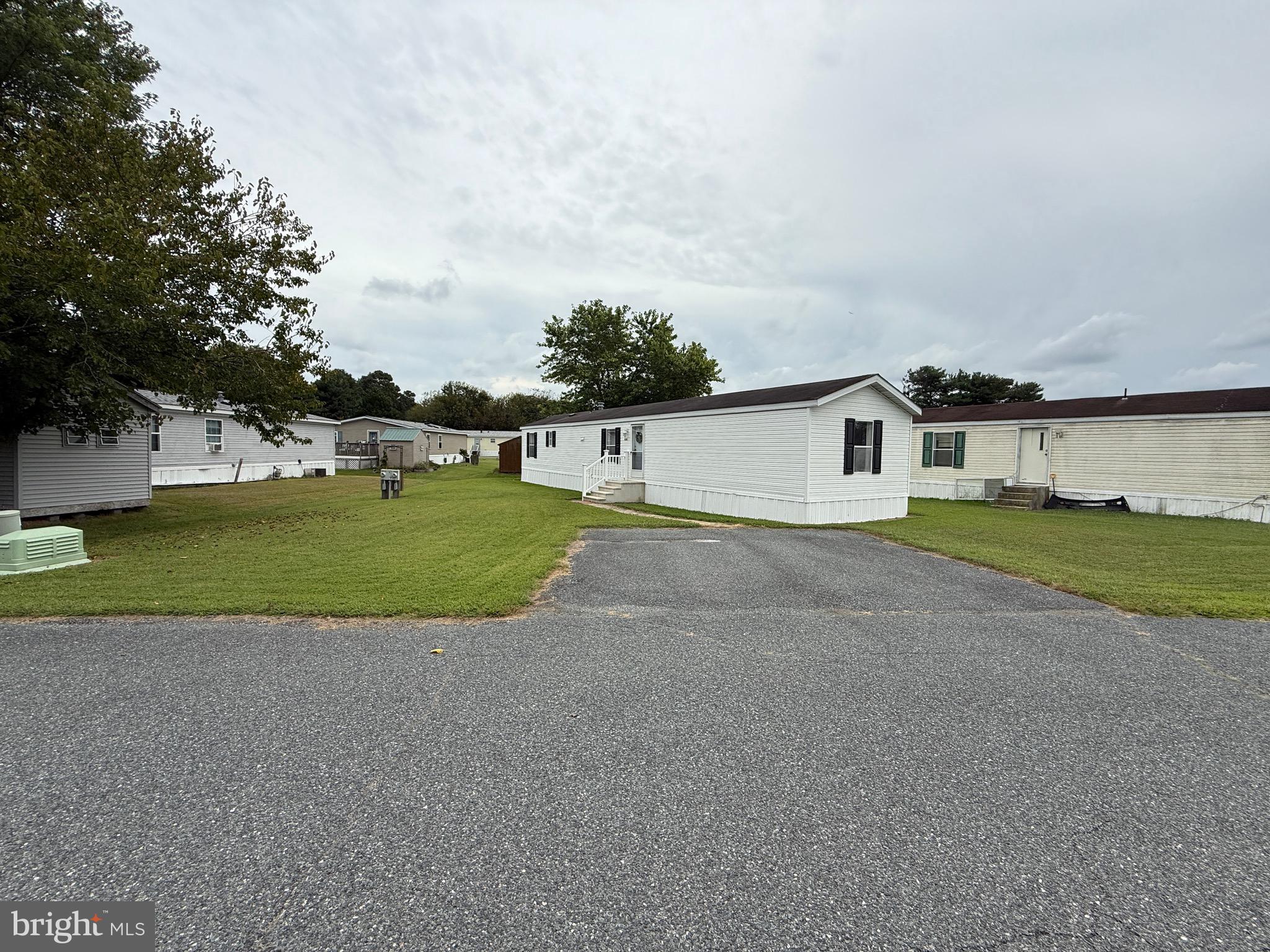 9241 Clare Circle Delmar, MD 21875 - Photo 2 of 30 a view of a house with a big yard