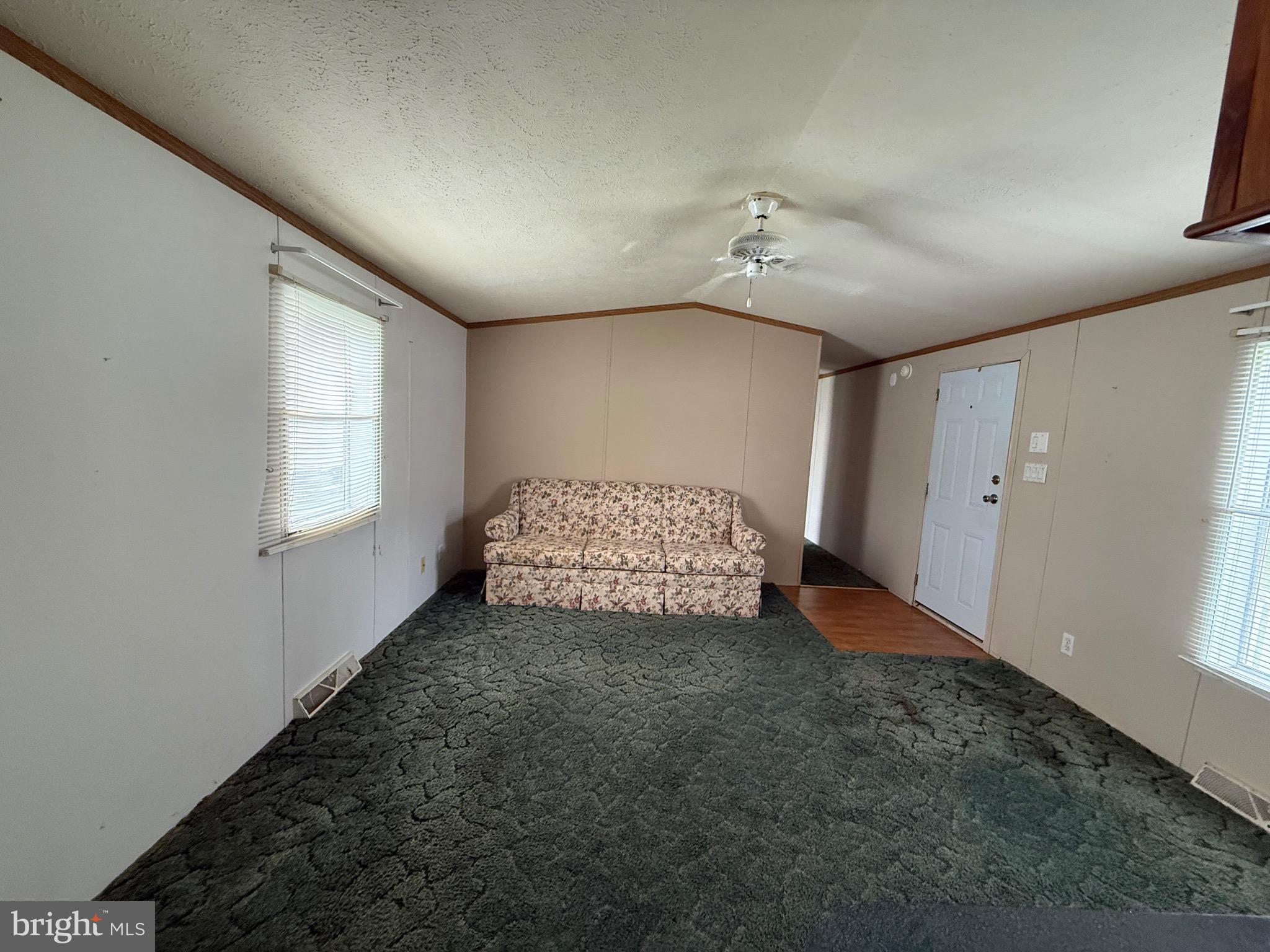 9241 Clare Circle Delmar, MD 21875 - Photo 10 of 30 a spacious bedroom with a bed and a window