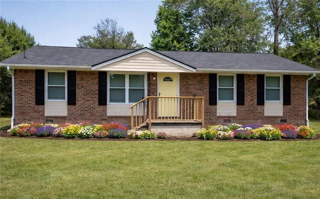 front view of a house with an outdoor space