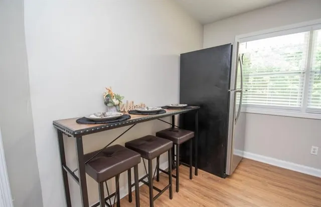 a view of a workspace with furniture