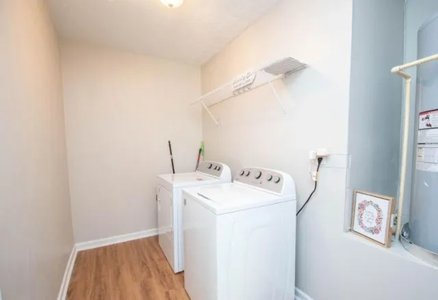 a utility room with dryer and washer