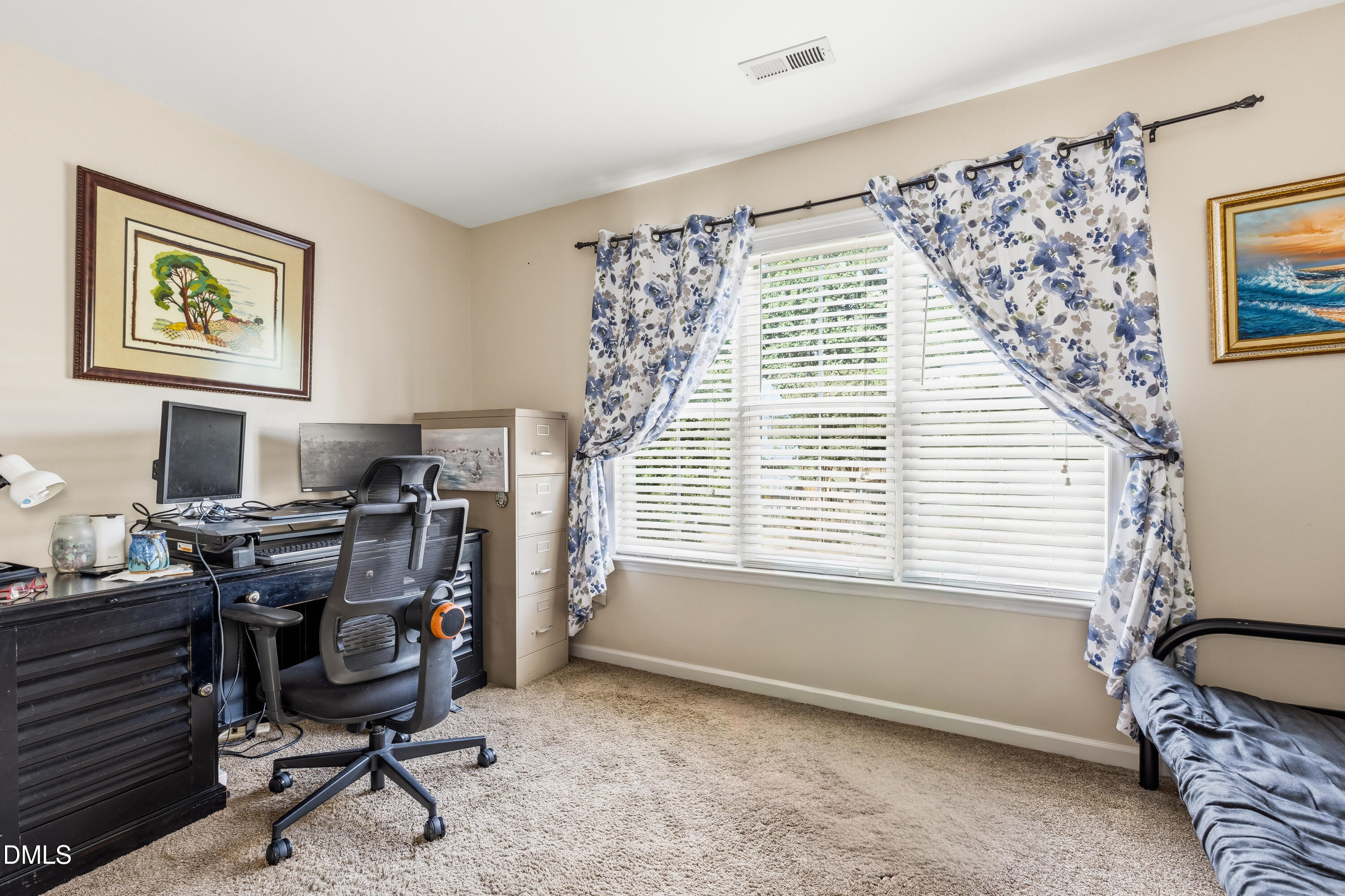 352 Arbor Crest Road Holly Springs, NC 27540 - Photo 23 of 36 a view of a workspace with furniture and a window