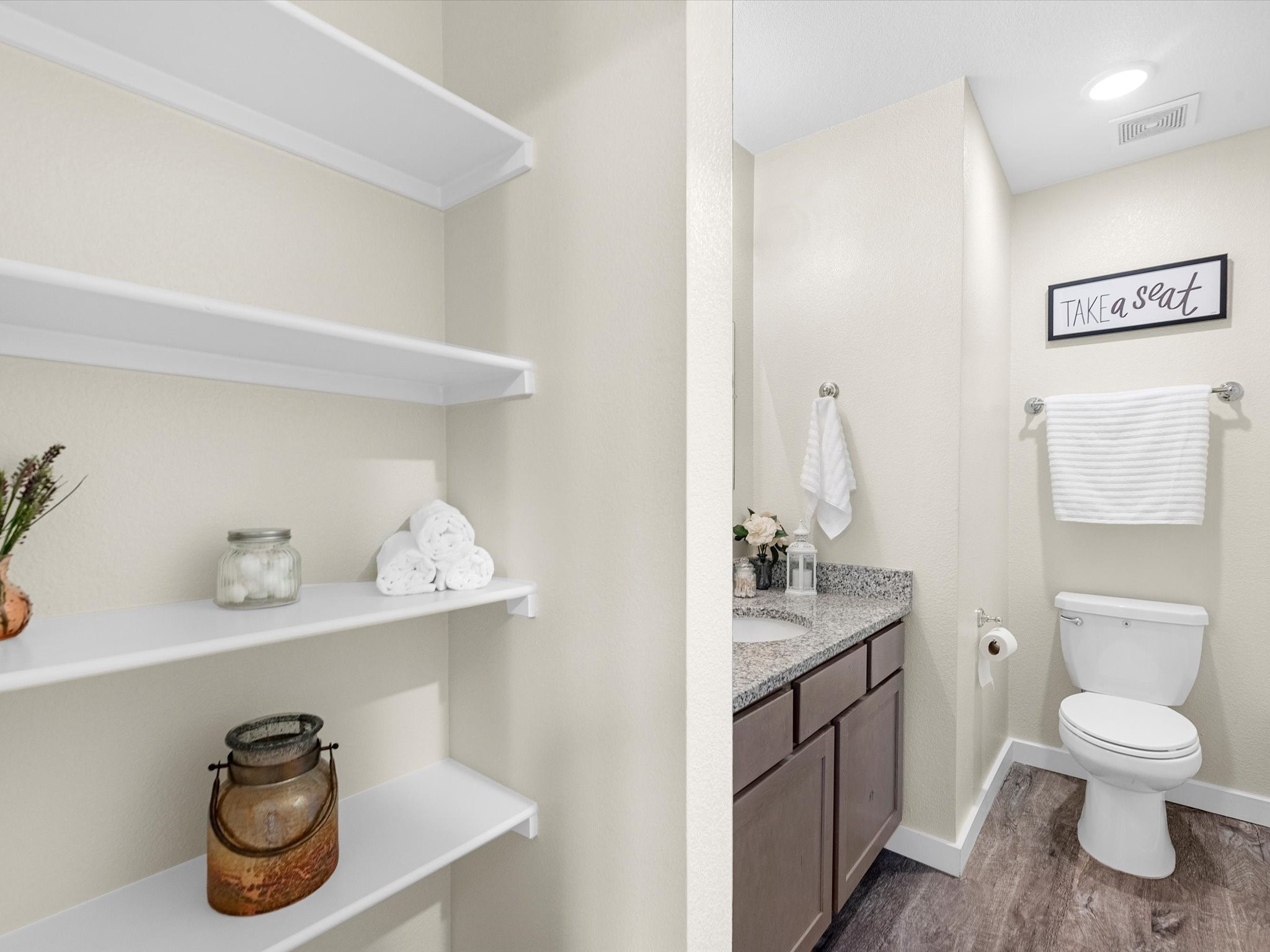 21155 Gosling Road, Unit 20A Spring, TX 77388 - Photo 12 of 37 a bathroom with a toilet a sink and a mirror