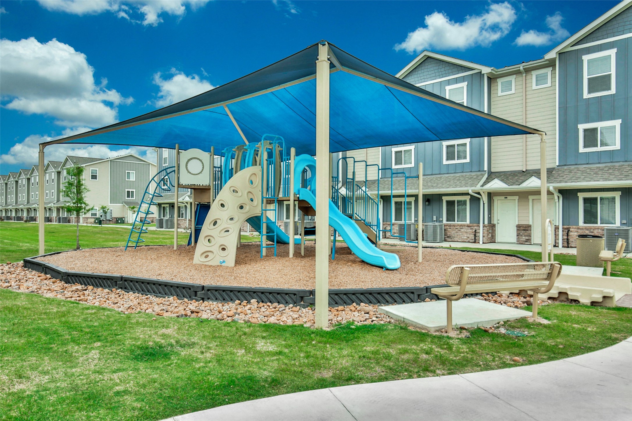21155 Gosling Road, Unit 20A Spring, TX 77388 - Photo 24 of 37 a view of a house with a yard patio and slide
