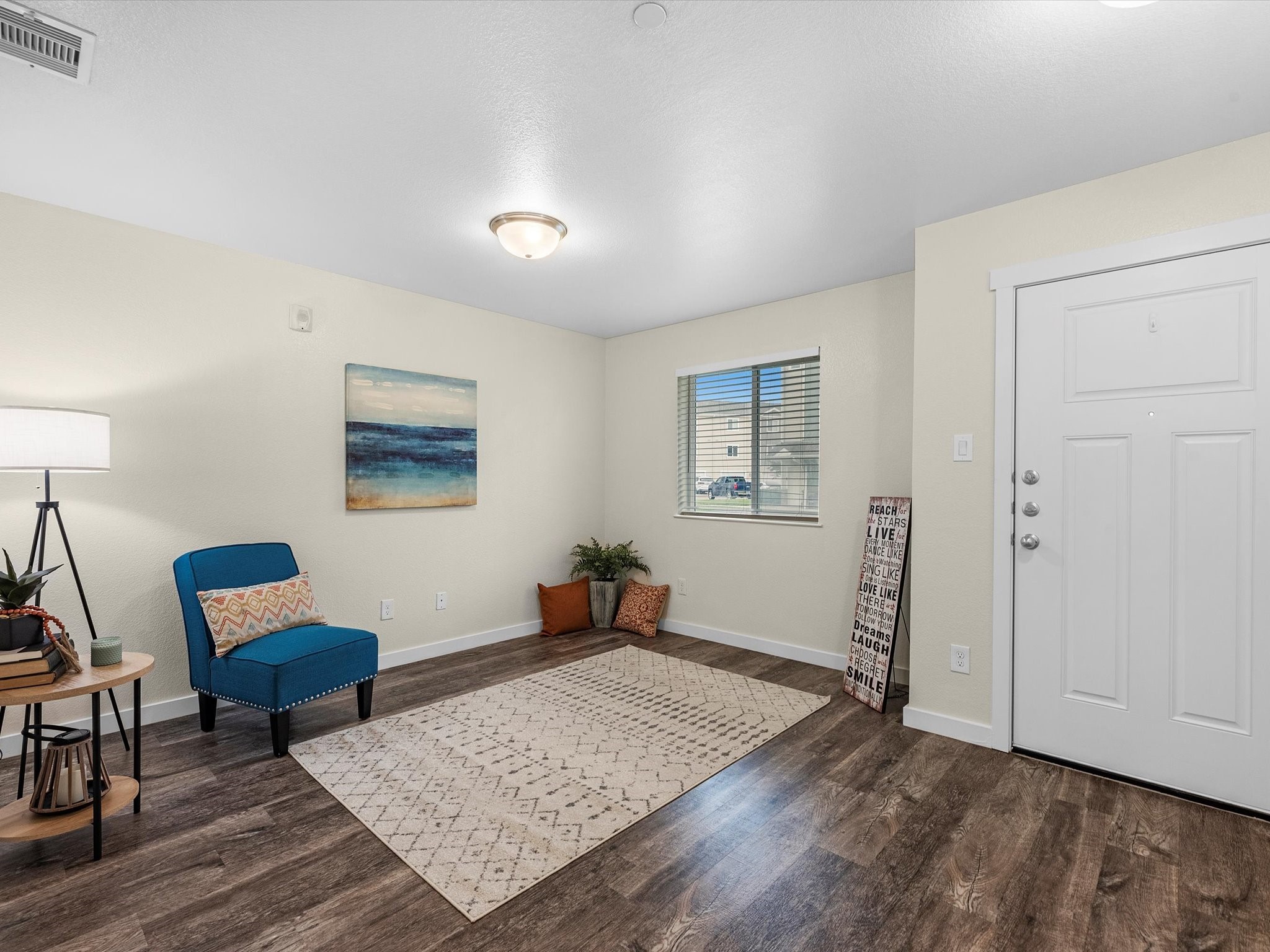 21155 Gosling Road, Unit 20A Spring, TX 77388 - Photo 6 of 37 a living room with furniture and a wooden floor
