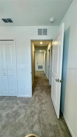 a view of a lake with a yard