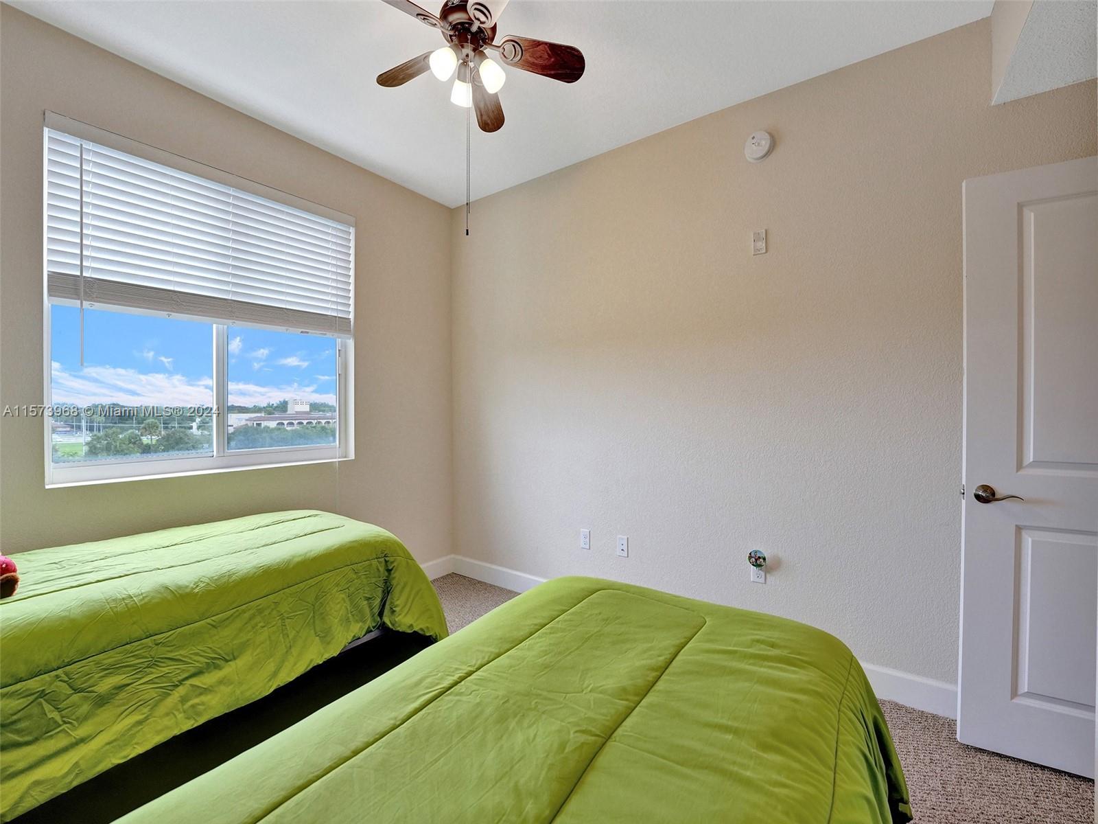 1660 Renaissance Commons Boulevard, Unit 2508 Boynton Beach, FL 33426 - Photo 16 of 28 a bedroom with a bed and a window