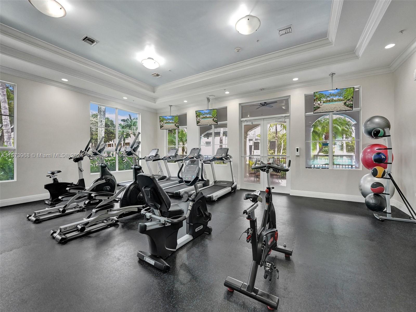1660 Renaissance Commons Boulevard, Unit 2508 Boynton Beach, FL 33426 - Photo 19 of 28 a view of a room with gym equipment